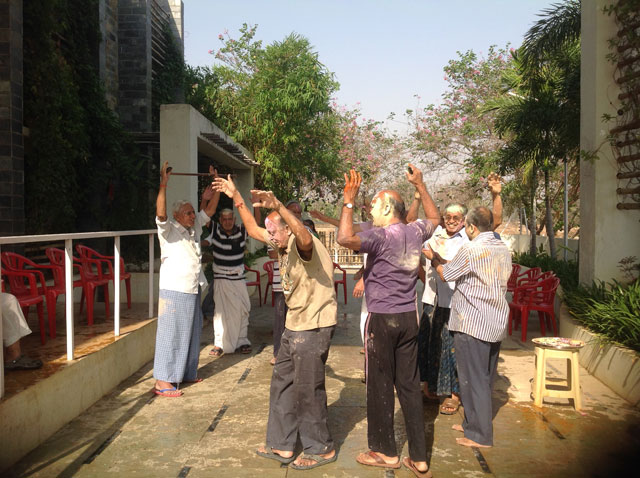 Residents and staff enjoying Holi 2016.